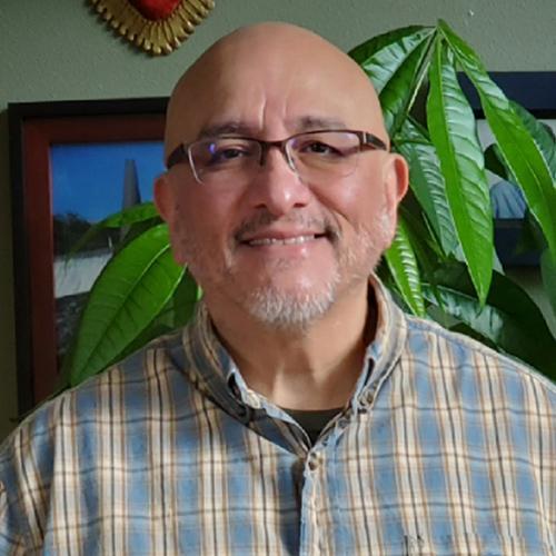Ramiro Vijarro, an attendant counselor 2 who supports several clients at a group home, including a quadriplegic who requires food care. Ramiro Vijarro, an attendant counselor 2 who supports several clients at a group home, including a quadriplegic who requires food care.
